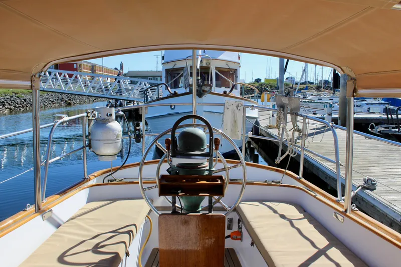 Slide: The Image of Cockpit view of 1988 Cape George 38 sailboat docked at marina. - 36
