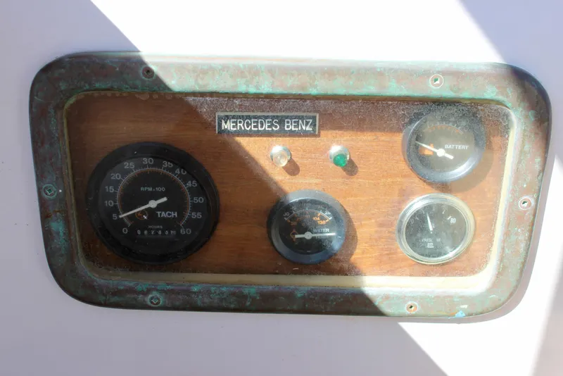 Slide: The Image of Dashboard of a 1988 Cape George 38 with Mercedes Benz gauges. - 40