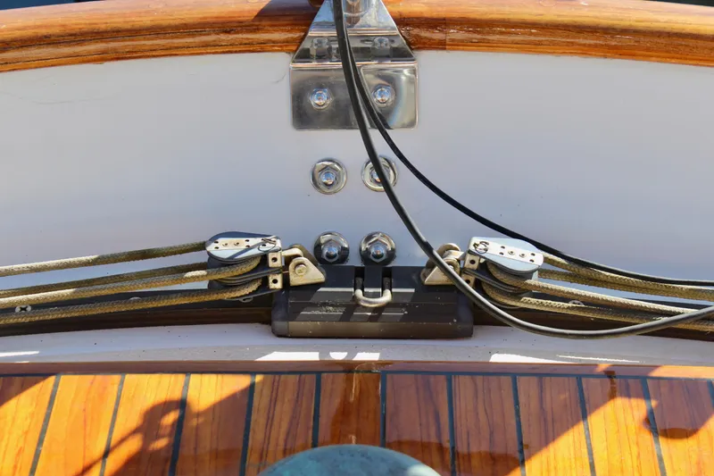 Slide: The Image of Deck detail of 1988 Cape George 38 sailboat with polished wood and rigging. - 42