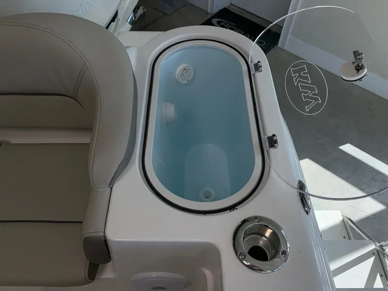 Slide: The Image of 2024 Key West 263 FS boat livewell and seating area. - 7
