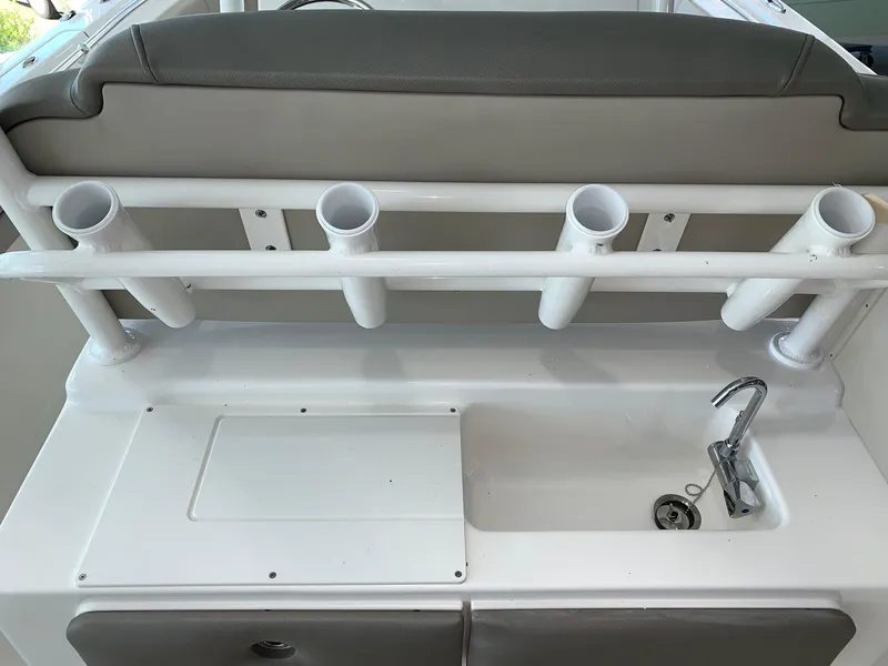 Slide: The Image of 2024 Key West 263 FS boat with rod holders and sink. - 10