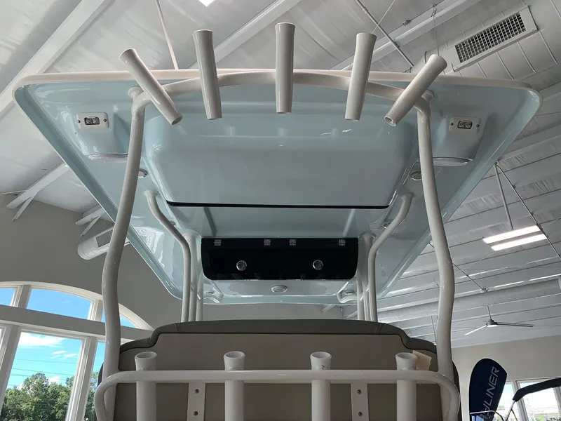 Slide: The Image of 2024 Key West 263 FS boat interior view with rod holders and T-top. - 5