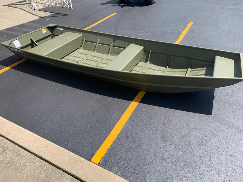 The Image of 2024 Lowe L1436 boat in a parking lot, showcasing its green exterior and spacious interior. - 0