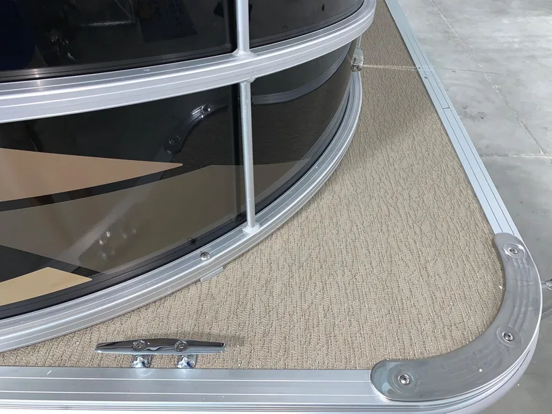 Slide: The Image of 2024 Starcraft LX22 F pontoon boat deck and railing detail. - 4