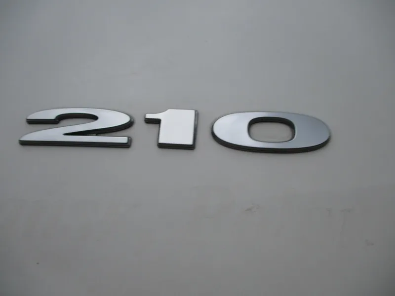 Slide: The Image of Sea Ray 210 SLX 2013: Close-up of the model name on the boat hull. - 21
