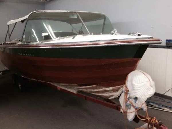 Slide: The Image of 1960 Century Coronado boat with wooden hull in indoor storage. - 3