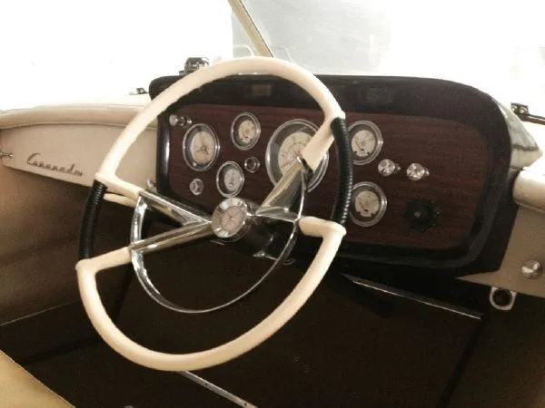 Slide: The Image of 1960 Century Coronado dashboard with vintage steering wheel and classic gauges. - 6