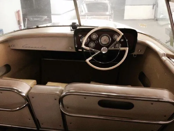 Slide: The Image of 1960 Century Coronado boat interior with vintage steering wheel and dashboard. - 9