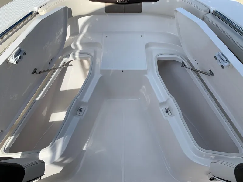 Slide: The Image of 2024 Robalo R202 Explorer boat storage compartments. - 19