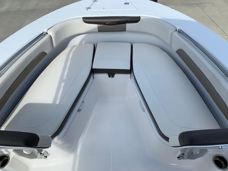 Slide: The Image of 2024 Robalo R202 Explorer boat interior with cushioned seating. - 20