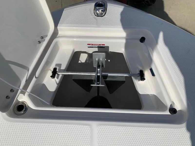 Slide: The Image of 2024 Robalo R202 Explorer anchor storage compartment. - 26
