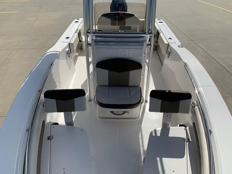 Slide: The Image of 2024 Robalo R202 Explorer boat interior with seating and console. - 9