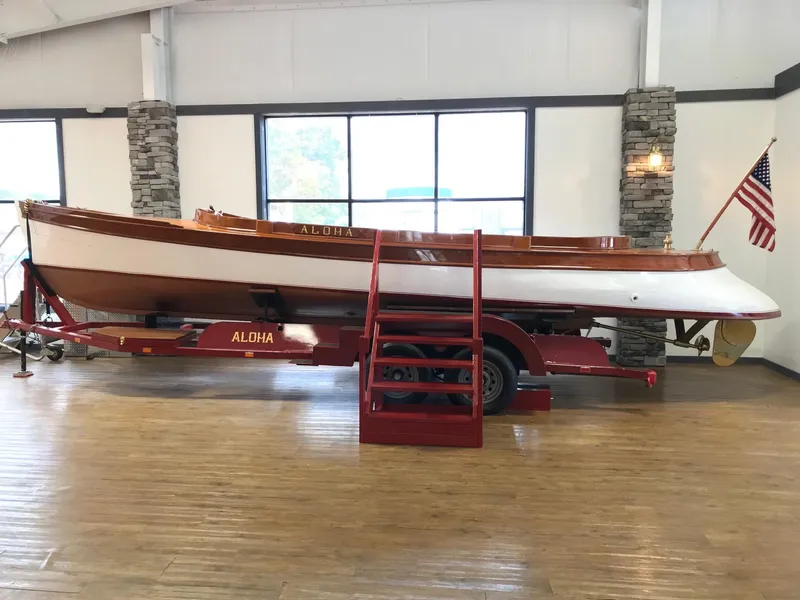 Slide: The Image of Vintage 1905 New York Launch 20 boat Aloha on display indoors. - 1