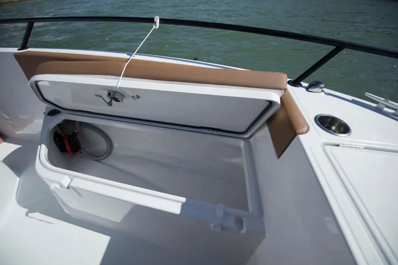 Slide: The Image of 2024 Beneteau Flyer 8 SPACEdeck storage compartment with open lid. - 12