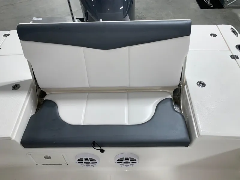 Slide: The Image of 2024 Robalo 226 Cayman boat seat with white and gray upholstery. - 7