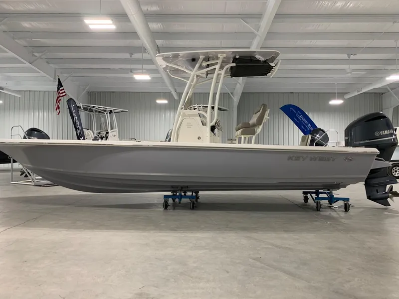 The Image of 2024 Key West 250 Bay Reef boat displayed in a showroom. - 0
