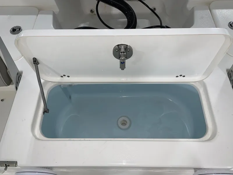 Slide: The Image of 2024 Key West 250 Bay Reef livewell with open lid. - 28