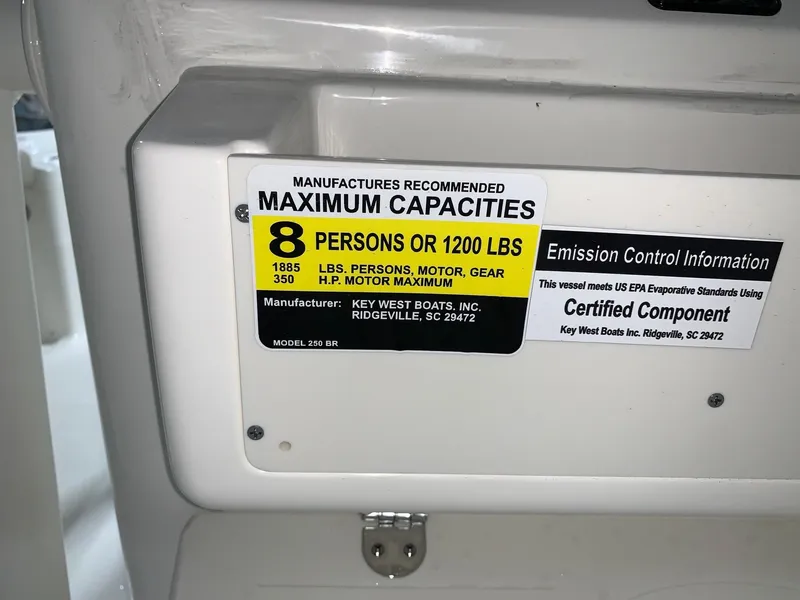 Slide: The Image of 2024 Key West 250 Bay Reef maximum capacities label, 8 persons or 1200 lbs. - 8