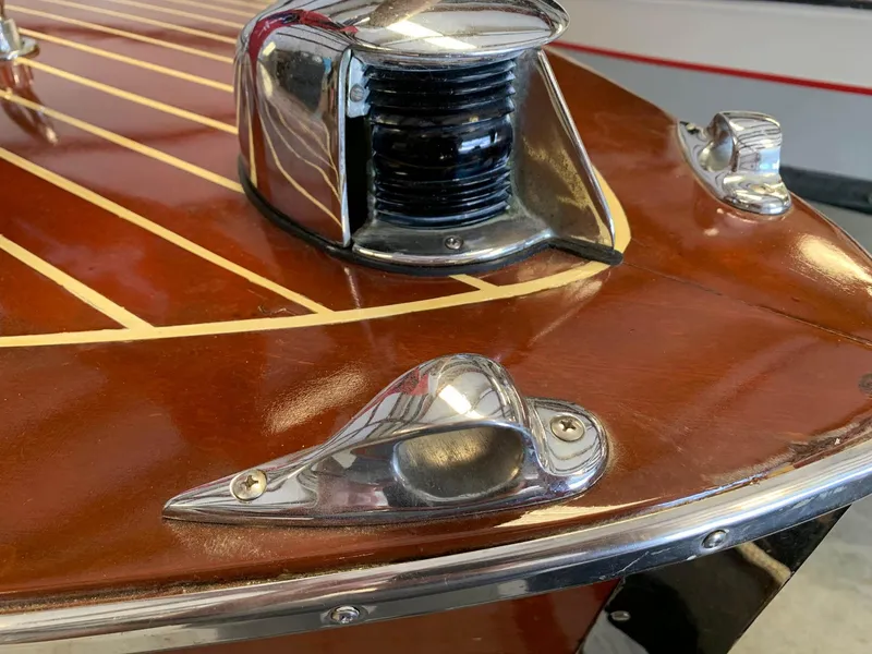 Slide: The Image of 1947 Chris-Craft 17 Runabout Deluxe, polished wood deck with chrome fittings. - 17