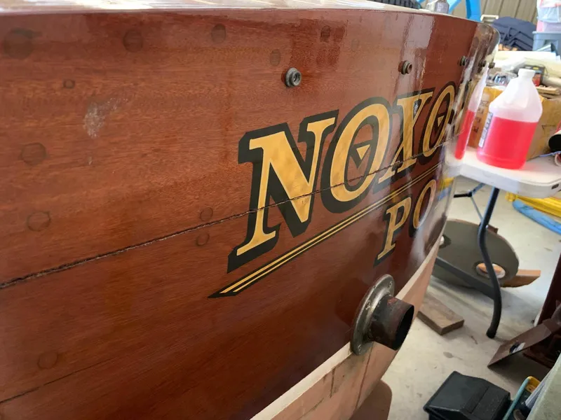 Slide: The Image of 1947 Chris-Craft 17 Runabout Deluxe boat with wooden finish and vintage lettering. - 20