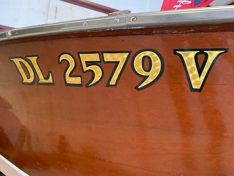Slide: The Image of 1947 Chris-Craft 17 Runabout Deluxe with registration DL 2579 V on wooden hull. - 22