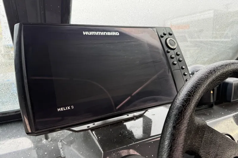 Slide: The Image of Humminbird Helix 9 fish finder on 2019 Fish Rite Stalker boat dashboard. - 43