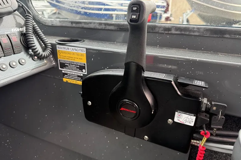 Slide: The Image of 2019 Fish Rite Stalker boat control panel with Mercury throttle lever. - 45