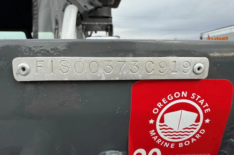 Slide: The Image of 2019 Fish Rite Stalker boat with Oregon State Marine Board sticker and serial number plate. - 53