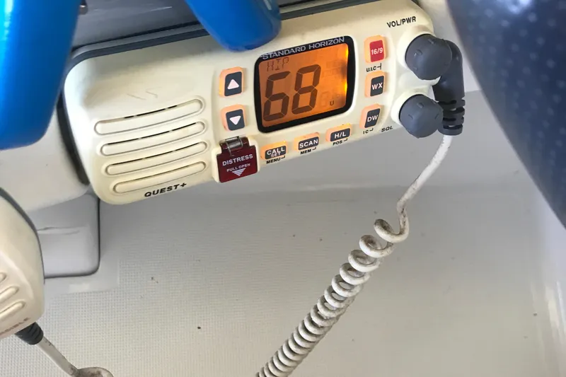 Slide: The Image of 2005 Formula 280 Sun Sport dashboard with steering wheel, gauges, and navigation system. - 11