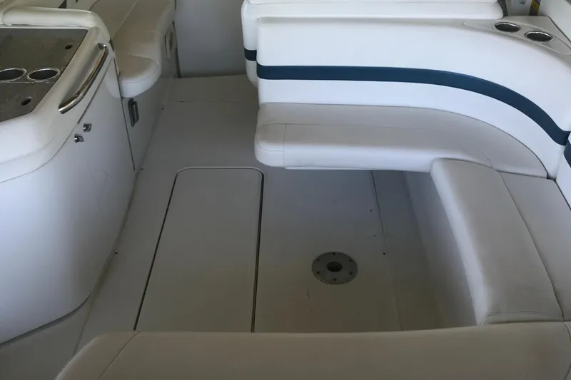 Slide: The Image of Dashboard of a 2005 Formula 280 Sun Sport boat with gauges and wood paneling. - 14