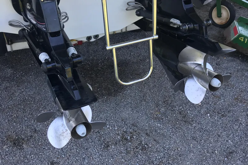 Slide: The Image of 2005 Formula 280 Sun Sport boat on trailer by the water. - 4