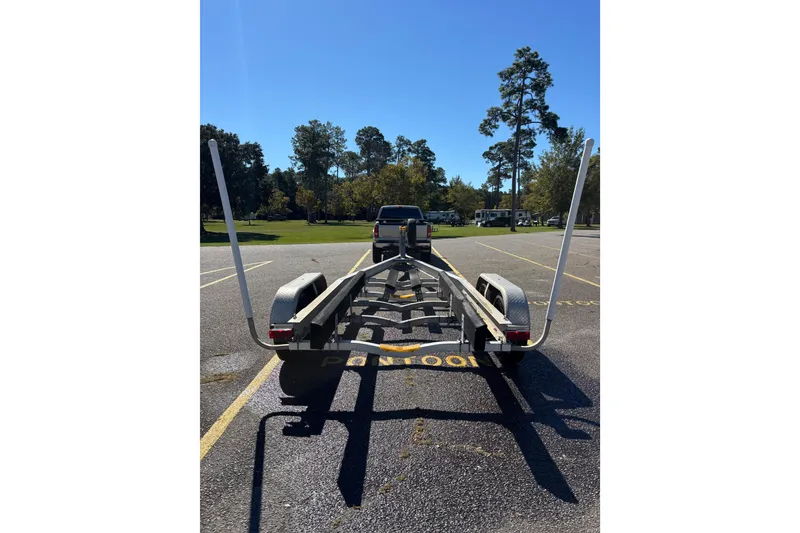 Slide: The Image of Trailer for 2005 Formula 280 Sun Sport in parking lot, sunny day, trees in background. - 45