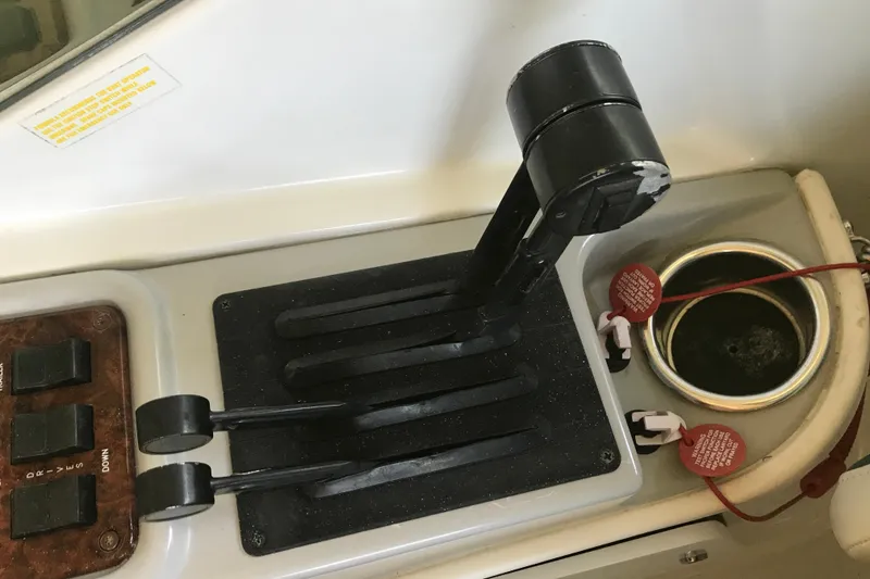 Slide: The Image of 2005 Formula 280 Sun Sport boat in storage, featuring spacious seating and control panel. - 9