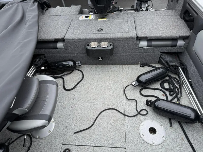 Slide: The Image of Interior of a 2021 Lund 1975 Tyee boat with seating and equipment. - 47