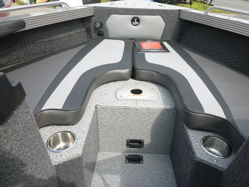 Slide: The Image of Interior of 2021 Lund 1975 Tyee boat with cushioned seating and cup holders. - 8
