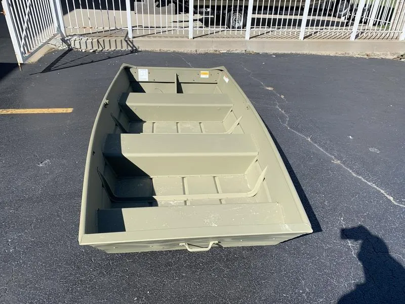 Slide: The Image of 2024 Lowe L1040 Jon boat on pavement, featuring a simple, durable design. - 7