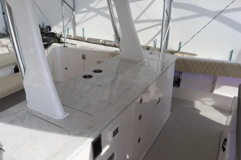 Slide: The Image of 2023 Regal 38 SAV boat interior with sleek countertops and modern design. - 25