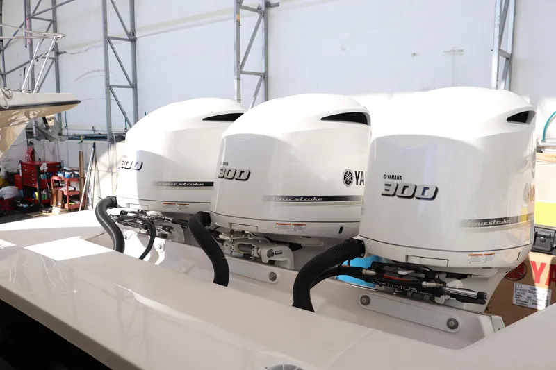 Slide: The Image of Triple Yamaha 300 outboard engines on a 2023 Regal 38 SAV boat. - 43