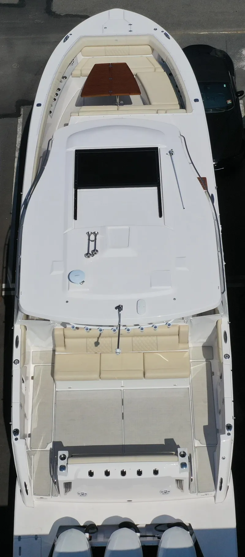 Slide: The Image of 2023 Regal 38 SAV boat, aerial view, showcasing sleek design and spacious deck layout. - 6