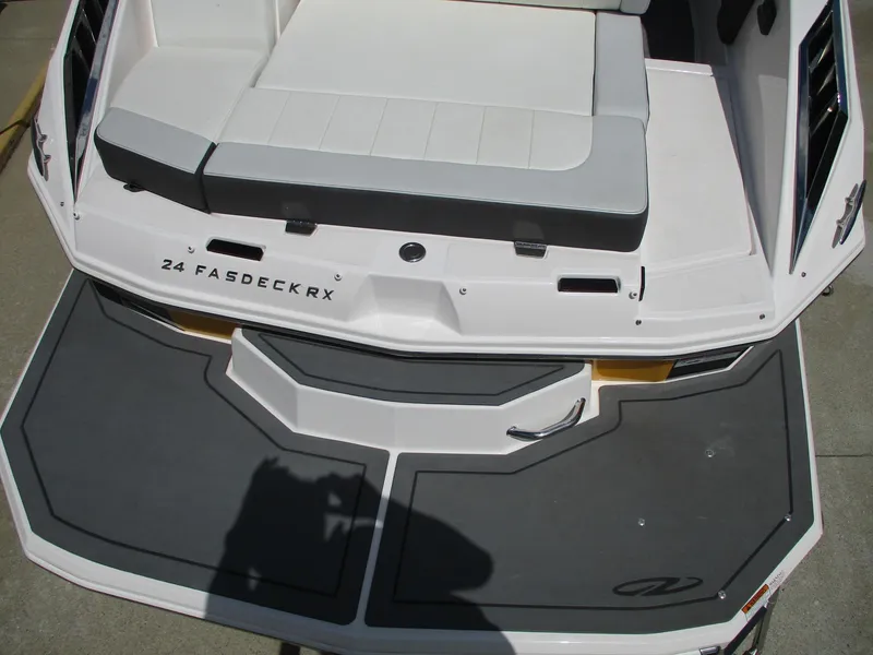 Slide: The Image of 2013 Regal 24 FasDeck RX boat with spacious seating and swim platform. - 16