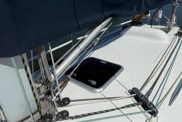 Slide: The Image of Deck of 2002 Beneteau First 36.7 sailboat with rigging and open hatch. - 10