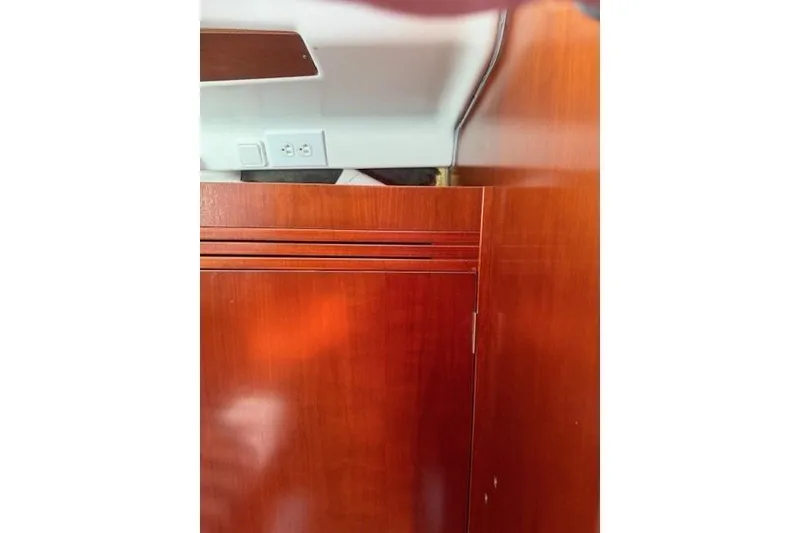 Slide: The Image of Interior view of 2002 Beneteau First 36.7 yacht with wooden cabinetry. - 29