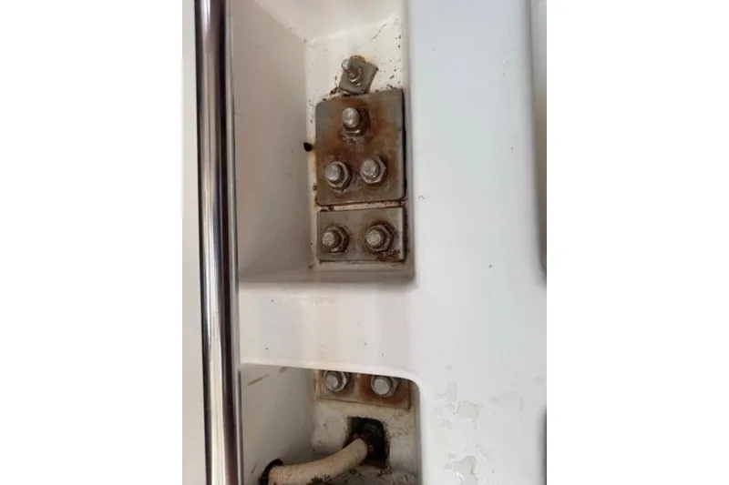 Slide: The Image of Close-up of a Beneteau First 36.7 sailboat's metal fittings and bolts, 2002 model. - 36