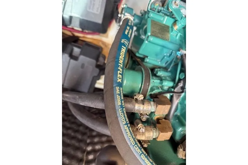 Slide: The Image of Engine compartment of a 2002 Beneteau First 36.7 with Trident-Flex hose. - 40