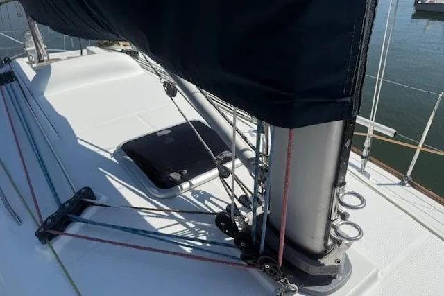 Slide: The Image of Beneteau First 36.7 sailboat deck, 2002 model, featuring rigging and hatch. - 6
