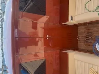 Slide: The Image of 2019 Hacker-Craft 35 Sea Limo Commuter with polished wood finish and beige seating. - 12