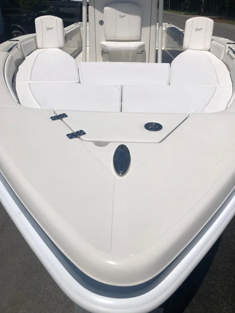 Slide: The Image of 2025 Ranger 2660 boat with sleek white deck and seating. - 11
