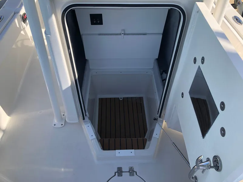 Slide: The Image of Ranger 2660 boat interior hatch with wooden flooring, 2025 model. - 28