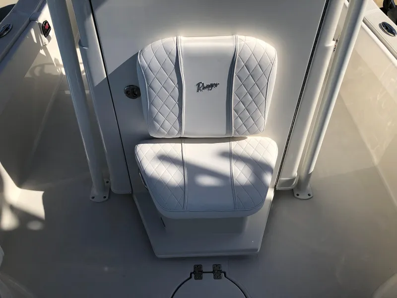 Slide: The Image of 2025 Ranger 2660 boat seat with white quilted upholstery. - 29
