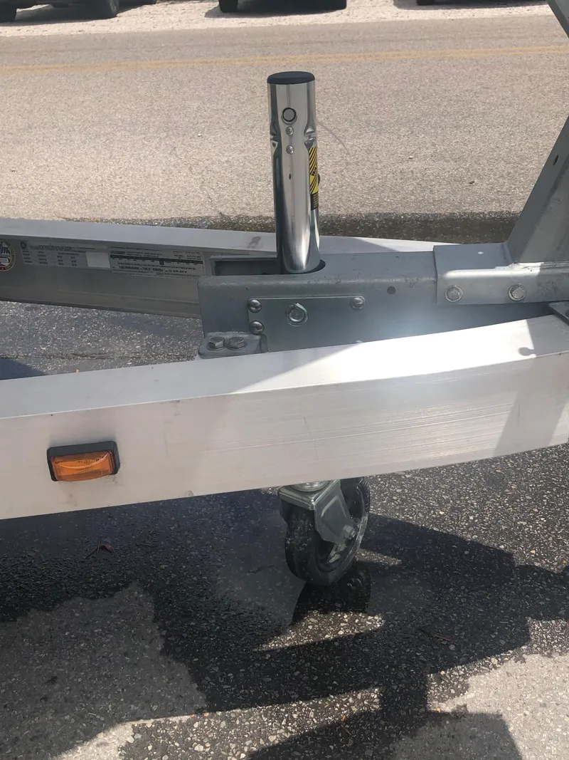 Slide: The Image of Ranger 2660 trailer hitch and wheel assembly, 2025 model, on asphalt surface. - 6
